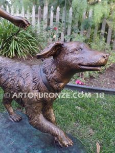 Friends for Life bronze sculpture of girl playing and running with her pet dog