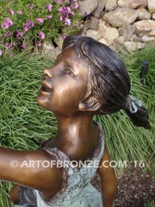 Enchanted Butterfly fantasy bronze sculpture of girl sitting on giant leaf with butterfly