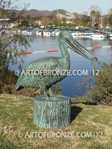 Fisherman bronze statue of tranquil pelican on bronze piling