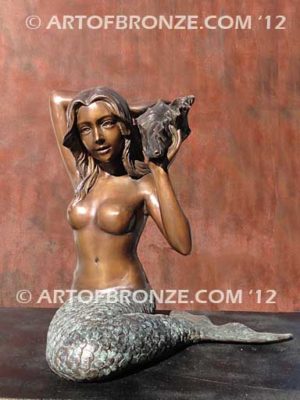 Bronze mermaid sculpture holding oyster shell for pond, pool or aquatic display