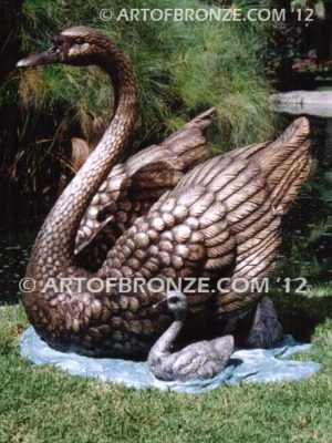 Swan Lake outdoor life-size garden statue of swan and playing cygnets