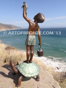 A Day to Remember Bronze sculpture of whimsical boy on turtle holding bucket of bullfrogs