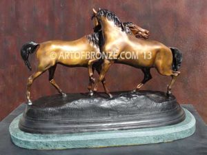 L’Accolade sculpture of standing stallion and Arabian mare from French animalier artist P.J. Mene.