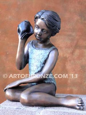 Ocean Sounds bronze sculpture for pool, garden or yard of young child holding conch shell
