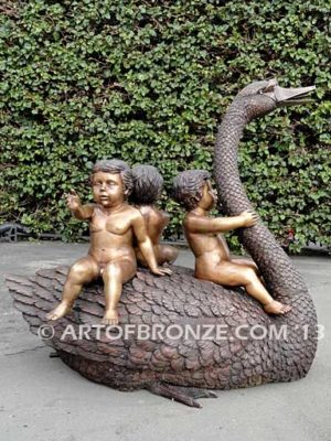 Fantasy bronze sculpture of playing cherubs on graceful swan
