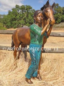 Dreams Come True bronze sculpture of girl petting her pony horse