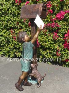 Letter to Grandma sculpture of dog and boy putting letter to grandma in mailbox