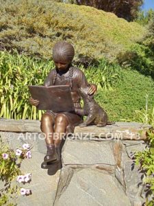Love and Devotion sculpture of young reader girl with dog and book
