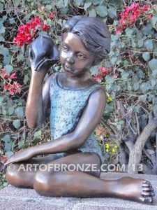 Ocean Sounds bronze sculpture for pool, garden or yard of young child holding conch shell