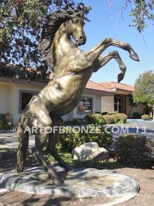 Wild Country sculpture of reared horse with forelegs off the ground and hind legs attached bronze base