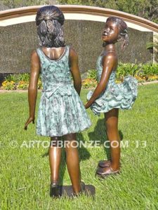 Dance Partners bronze sculpture of two ballerinas holding hands