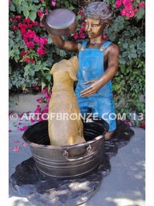 Bath time bronze sculpture fountain of boy washing his dog