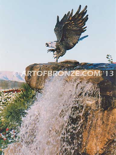 Alaskan Dinner bronze sculpture of monumental life-size eagle.