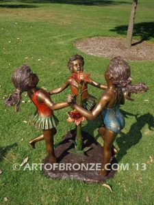 Ring Around fountain sculpture of three girls holding hands and dancing around