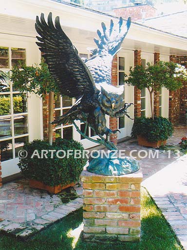 Owl lost wax casting of magnificent and powerful owl hunting