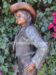 Wild West Spirit bronze sculpture of western cowgirl wearing a Stetson and holding a rope