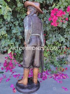 Wild West Spirit bronze sculpture of western cowgirl wearing a Stetson and holding a rope