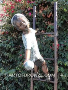 Picking Apples bronze sculpture of young boy holding up ladder for his brother climbing up