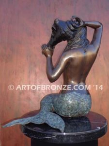 Bronze mermaid sculpture holding oyster shell for pond, pool or aquatic display