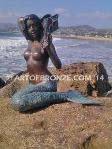 Bronze mermaid sculpture holding oyster shell for pond, pool or aquatic display