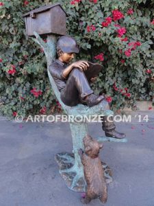 Waiting Patiently bronze sculpture mailbox of boy reading book with his dog