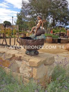 Special Reserve bronze sculpture fountain of cherub sitting on wine barrel