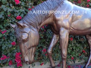 Thoroughbred bronze sculpture of grazing horse for ranch or equestrian center