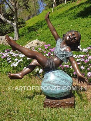 Favorite Student bronze sculpture of girl atop apple