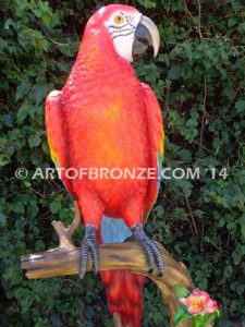 Scarlet Macaw outdoor statue of life-size wild Macaw on a branch