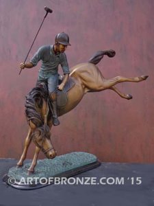 Change of Direction sculpture of polo player riding his leaping polo pony attached to a marble base