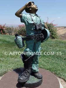 Home of the Brave bronze sculpture of saluting boy dressed up playing soldier