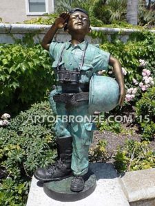 Home of the Brave bronze sculpture of saluting boy dressed up playing soldier