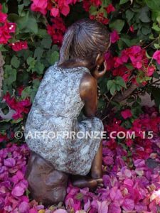 Cutie Pie bronze statue of girl relaxing in a daydream