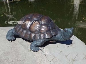 Great One sculpture of large bronze turtle that can spray water from mouth into fountain