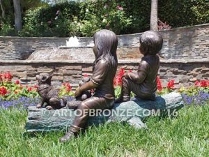 Magic Memories bronze sculpture two children playing with dog for garden or yard display