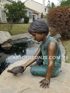Ready for the Race bronze sculpture of boy playing with his pet painted turtle