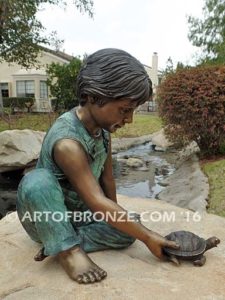 Ready for the Race bronze sculpture of boy playing with his pet painted turtle