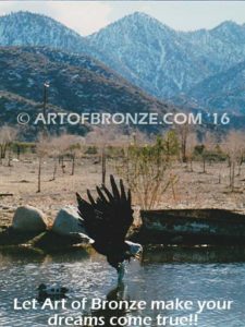 Alaskan Dinner bronze sculpture of monumental life-size eagle.