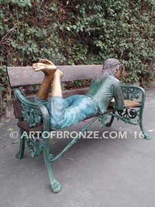 Best in Class bronze sculpture of young girl resting on bench reading her favorite novel