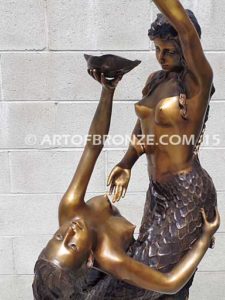 Bronze mermaid sculpture holding oyster shell for pond, pool or aquatic display