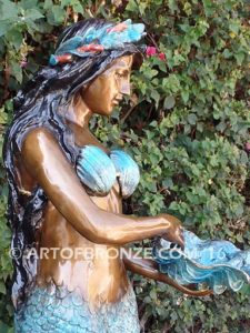 Bronze mermaid sculpture holding oyster shell for pond, pool or aquatic display
