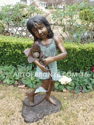 Summer Bloom bronze sculpture of girl holding sunflower