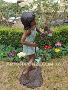 Summer Bloom bronze sculpture of girl holding sunflower