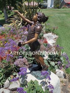 Faith and Hope bronze statue of young standing girl with doves in her hands