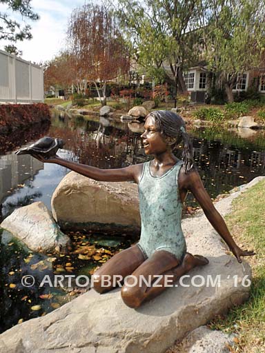 New Surprise sculpture of teenage girl in bathing suit and shell
