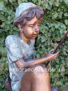 No Fishn bronze fisherman sculpture fountain in backyard stream