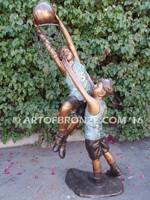 Taking it to the Hoop bronze sculpture of junior basketball players dunking