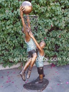 Takin it to the Hoop bronze sculpture of junior basketball players dunking