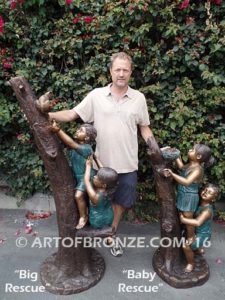 Baby Rescue Bronze Statue of kids playing together rescuing baby birds in tree