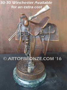 A Good Days Work bronze sculpture of western horse saddle attached to a marble base